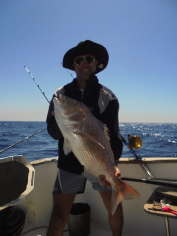 Mario with an Algarve Golden Snapper Mario with an Algarve Golden Snapper